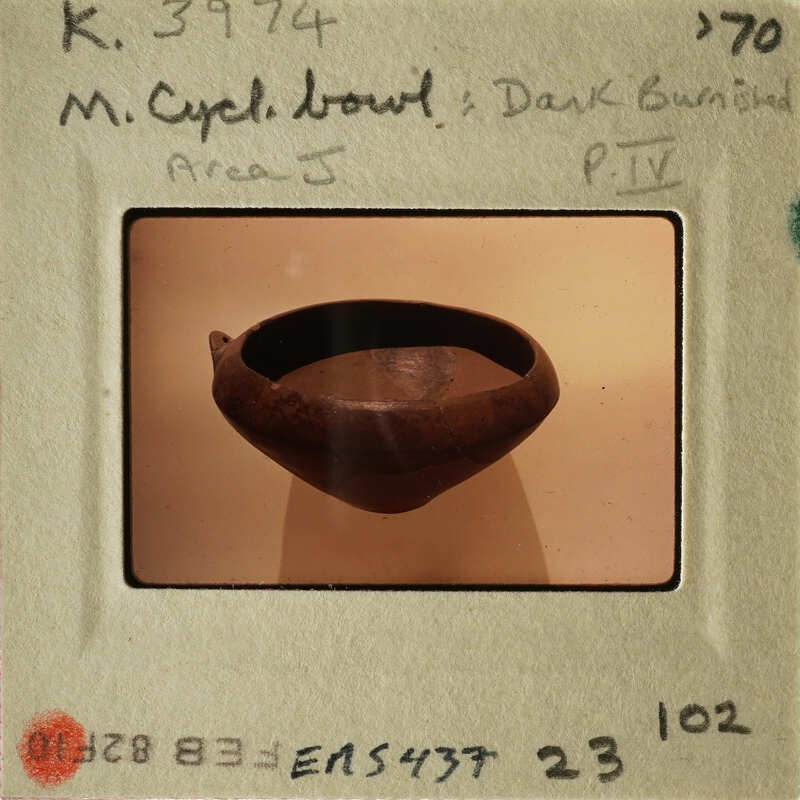 Ancient clay bowl on display.