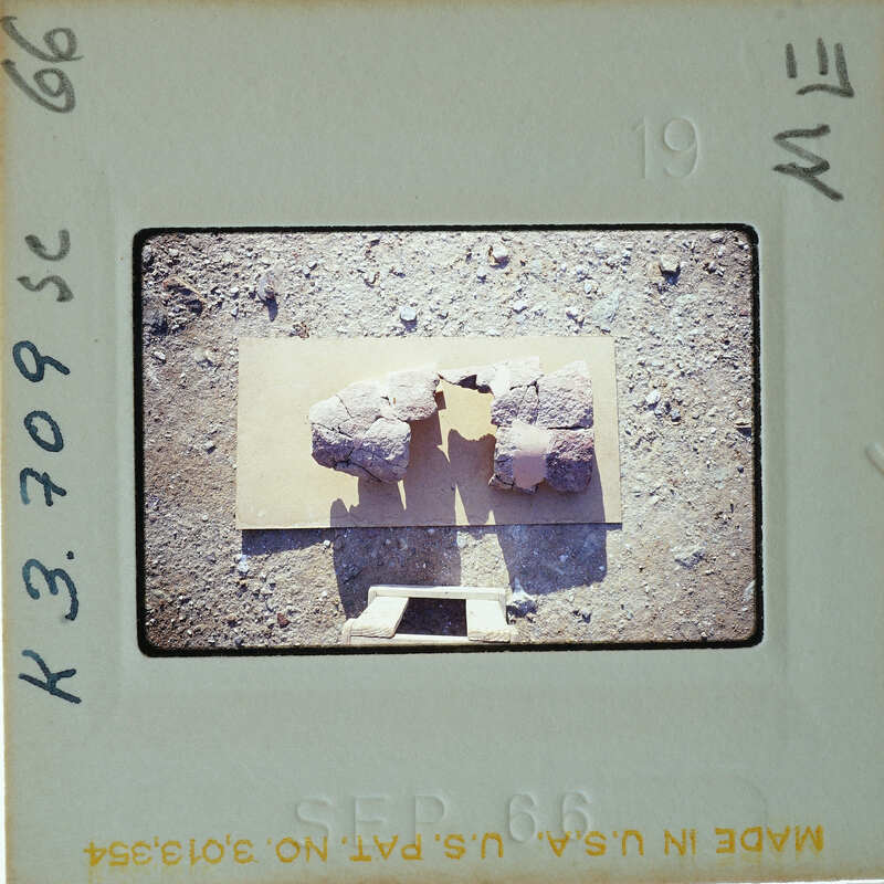 A film strip with a photograph of two rocks on it.