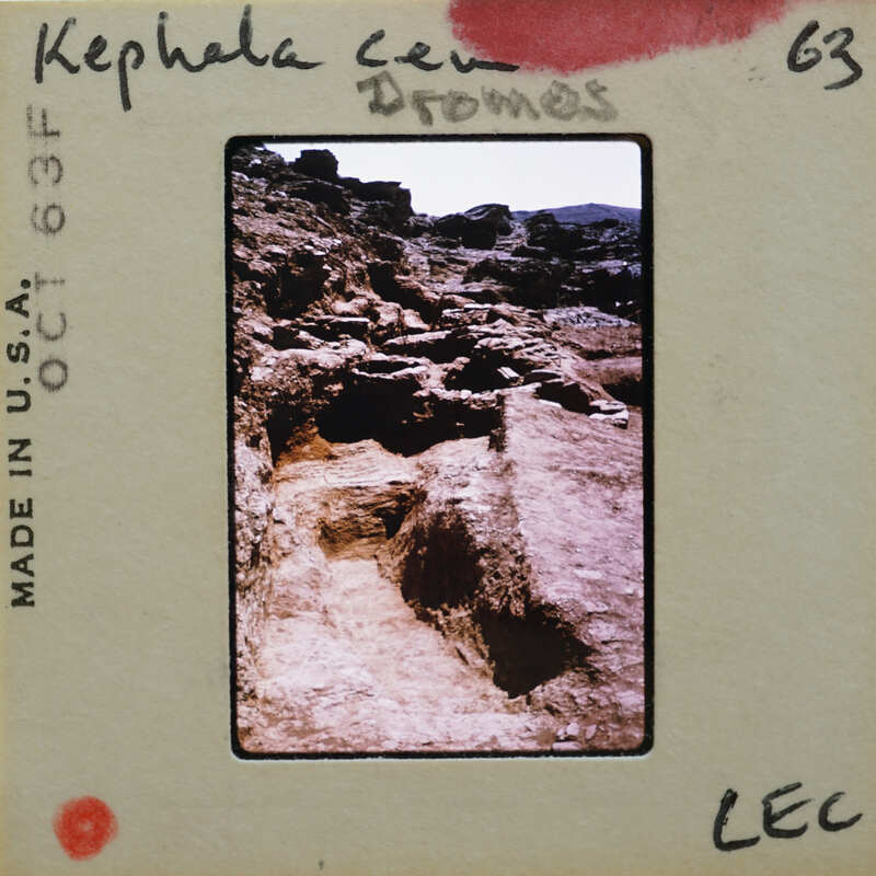 A slide of an ancient archaeological site with ruins and trenches.