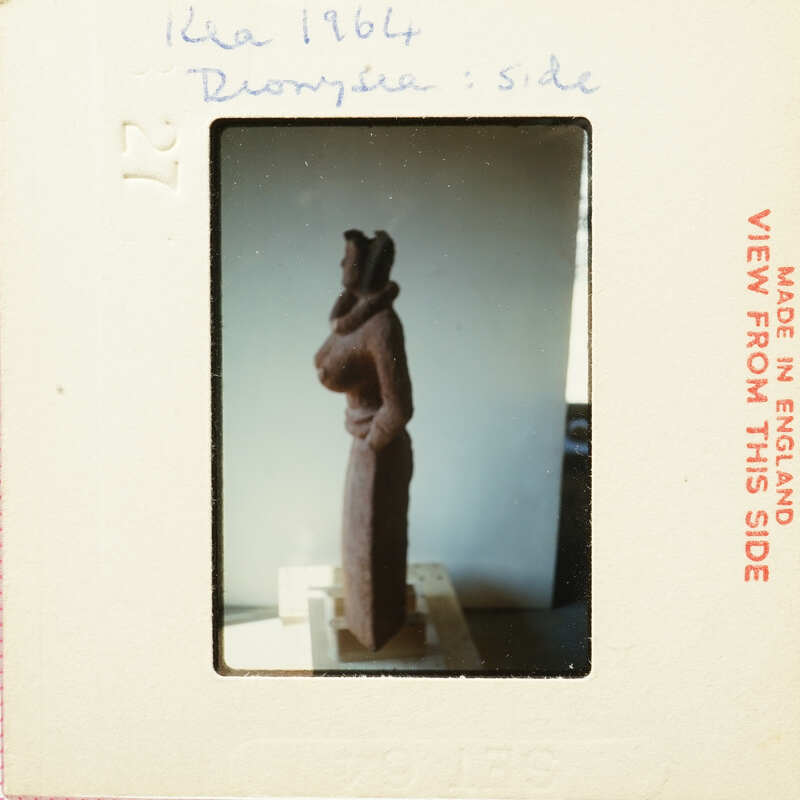 Brown clay sculpture on display.