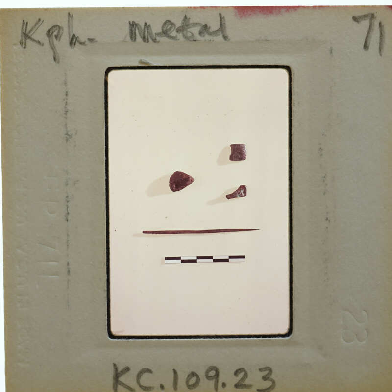 Four metal objects on white background with scalebar.