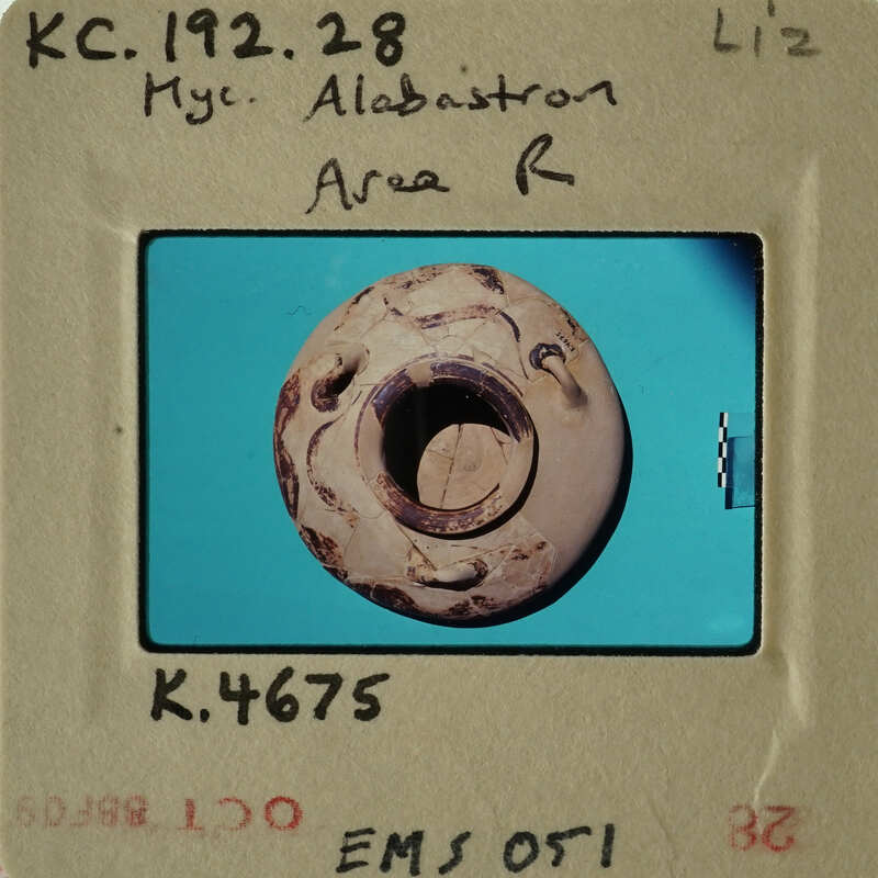 Ancient pottery with intricate designs on display.