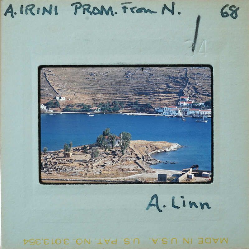 Coastal town with a body of water and boats,