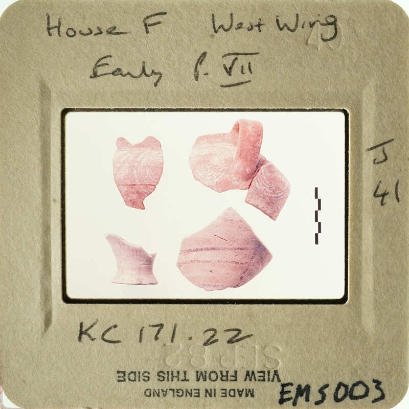 Photograph of ancient pottery shards on display.