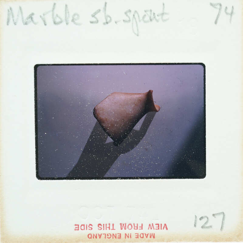 Fragment of stone vase showing spout.