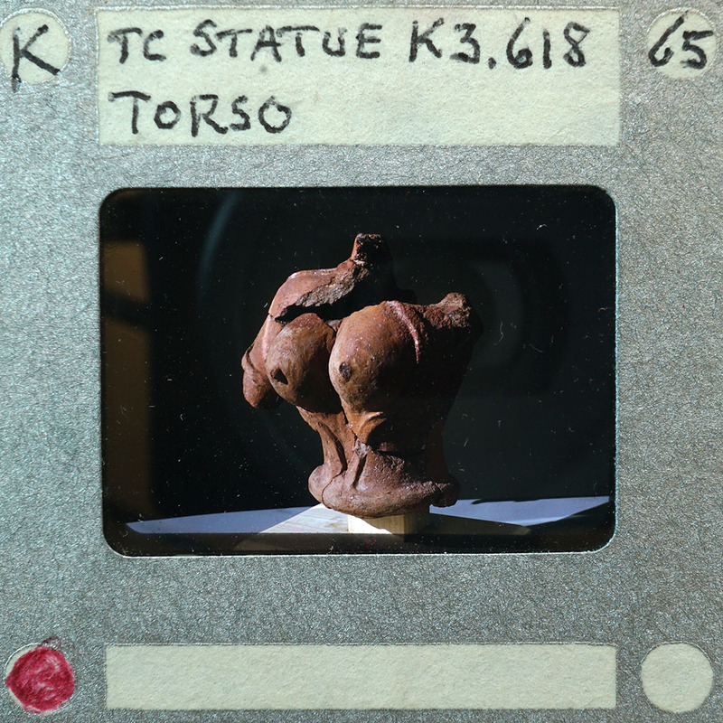 Terracotta figurine fragment of female torso 3/4 view K3.618.