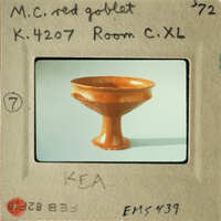Old photograph of an antique bowl with a label on a cardboard mount.