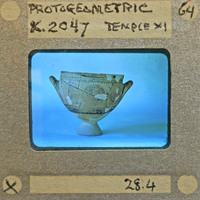 Reassembled bowl with swirl design in profile, K.2047.