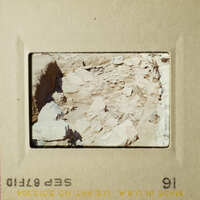 This is an image of a rocky landscape, likely an archaeological site, as seen through a microscope.