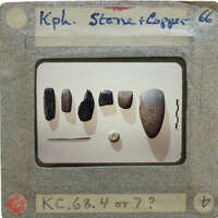 A slide of a collection of stone and metal objects with labels.