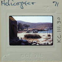 Helicopter ready to take off from harbor.