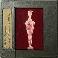 Ancient Egyptian statue on a film reel.