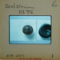 Two black and white images of a dark object on a light background, possibly an artifact or specimen, with labels indicating "SEALSTON" and "K1 L76".