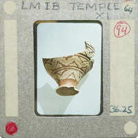 An ancient ceramic vase with intricate patterns.