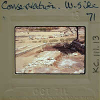 This is an image of a historical site with stone ruins and vegetation, captured on a film strip with a label indicating it's from October 1971.