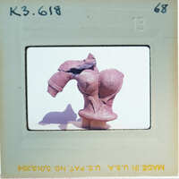 Terracotta figurine torso missing right arm.