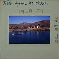 Picture of a lake with boats and mountains, dated 19-9-71.