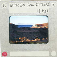 Photo of a landscape with a body of water and hills, taken on September 19th, 1971 from Europe.