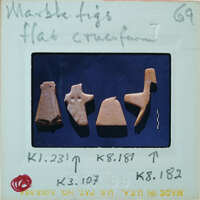 Four marble figurine fragments, K1.231 K3.107 K8.181 K8.182.