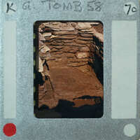 A photograph of a stone structure, possibly an old building or monument.