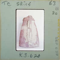 Terracotta figurine detail showing skirt from the back.