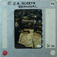 Photo of archaeologists working on a site with ancient ruins, labeled "C. E. H. HEART REMOVAL" and dated "29/40".