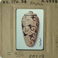 Ancient vase with intricate designs on display.