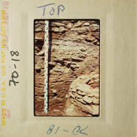 Image shows a ruler placed on top of an archaeological site, indicating scale, with a note "TOP" and a date stamp "07-18-96."