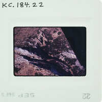 A photograph of a mountain landscape with an image strip at the bottom showing its development process.