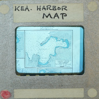 A framed vintage map of Kealakekua Harbor.