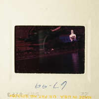 A scenic view of a church and waterfront, captured on an old photograph.