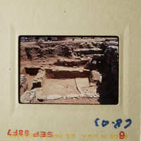 This photo depicts an ancient, abandoned stone structure with remnants of walls and foundations.