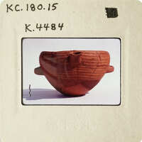 Ancient ceramic bowl with intricate designs on display.