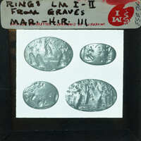 Photo of book plate of ancient gold rings.