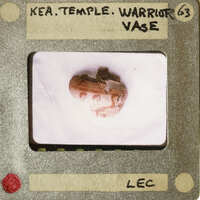 Ancient vase with intricate designs on display.