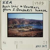 Scenic view of a lake with mountains in the background, as seen on an old photograph.