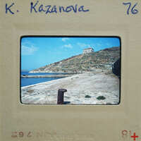 A vintage photograph of a coastal fortress with the name "K. KAZANOVA" written on it.