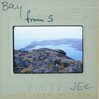 Picture of a scenic landscape with mountains and water, taken on August 26th, 1978.