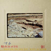 The images show two different scenes, one with a rocky landscape and the other with a stone wall and rocks.