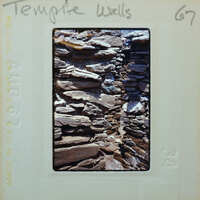 Detail of stone wall with uneven stones.