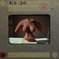 Front view of female terracotta torso K0.30.