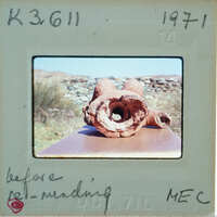 Bottom view of terracotta figurine showing round waist area.