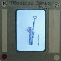 Small bronze figurine of a person with a raised object, possibly a weapon or tool, on an identification card with measurements and labels.