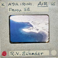 Aerial photograph of a coastline with annotations on the frame.