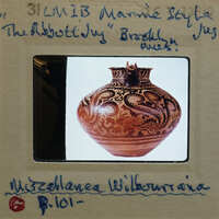 Photo from printed volume showing pot in profile with marine style painting.