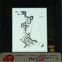 Black and white map of a complex with labeled rooms and pathways.