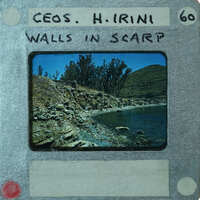 A scenic coastal area with rocks and water.