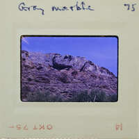Picture of a mountain with a vintage film strip border.