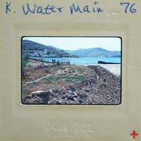 This is a vintage photo of a coastal landscape with a watermark and date stamp on the bottom right corner.