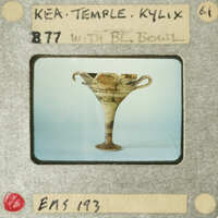 Ancient Greek bronze cup with handle.